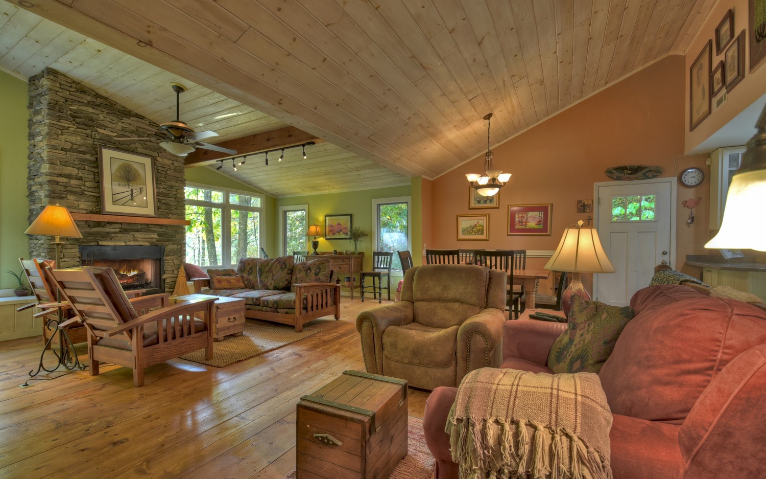 63 Chimney Court Ellijay, GA 30540 - Photo 8 of 49 a living room with furniture a lamp and a fireplace