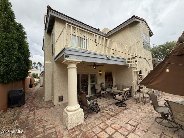 a view of a building with sitting area