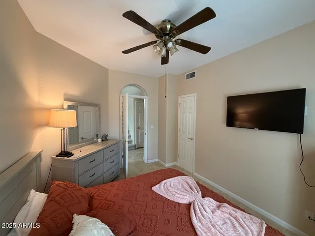 a utility room with sink dryer and washer