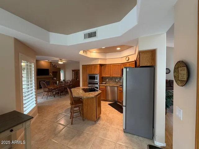 a very nice looking kitchen with a large window