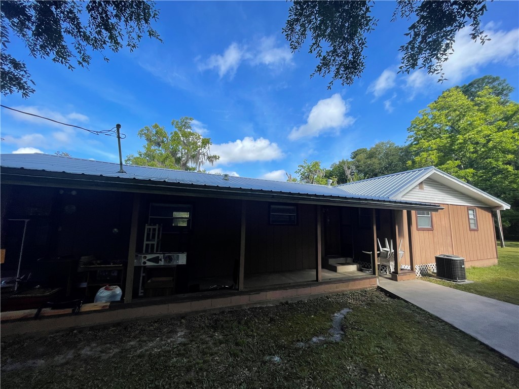 45013 Bismark Road Callahan, FL 32011 - Photo 22 of 26 a front view of a house with a yard
