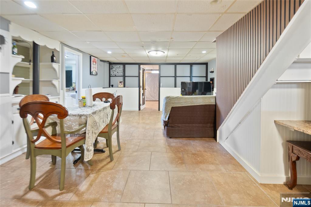 120 South Prospect Avenue Hackensack, NJ 07601 - Photo 19 of 24 a dining room with furniture and wooden floor