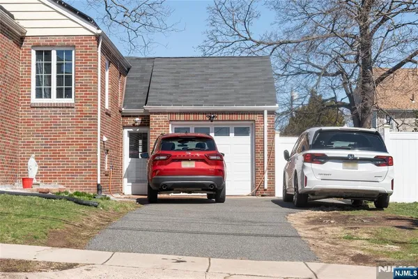 a car parked in front of a house
