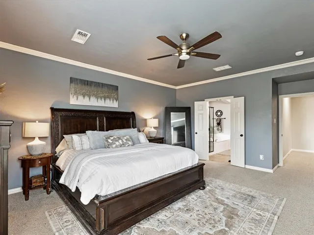 a bathroom with a sink vanity and a mirror