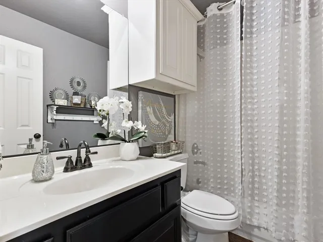 a projector room with fireplace furniture and a projector