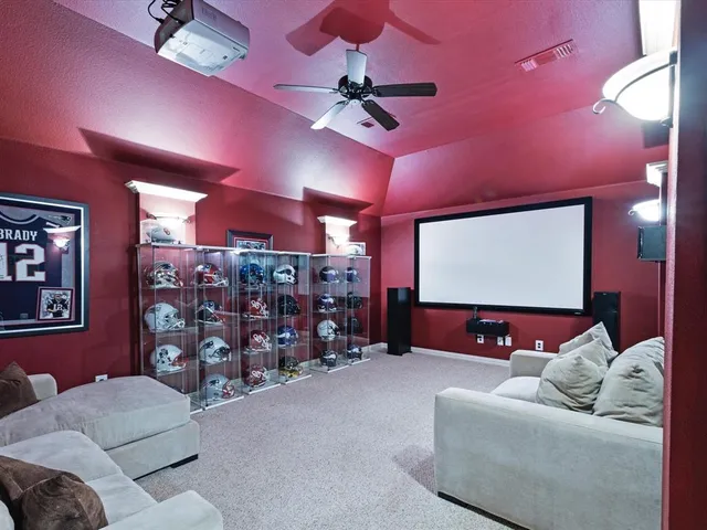 a view of a patio with a table and chairs