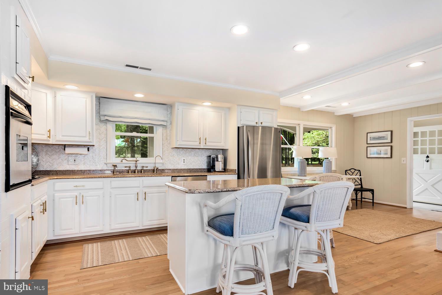 9698 Leeds Landing Road Easton, MD 21601 - Photo 19 of 49 Kitchen with island & breakfast bar