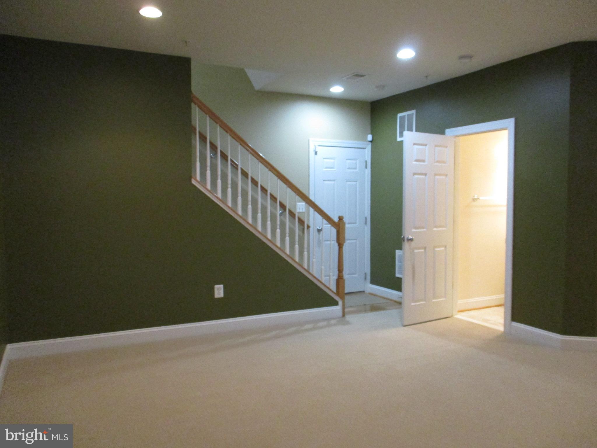 3547 Goddard Way Alexandria, VA 22304 - Photo 6 of 38 a view of an empty room with stairs