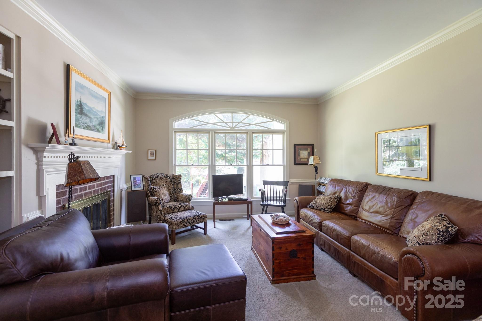 9112 Laurel Ridge Trail Charlotte, NC 28269 - Photo 12 of 38 a living room with furniture and a large window