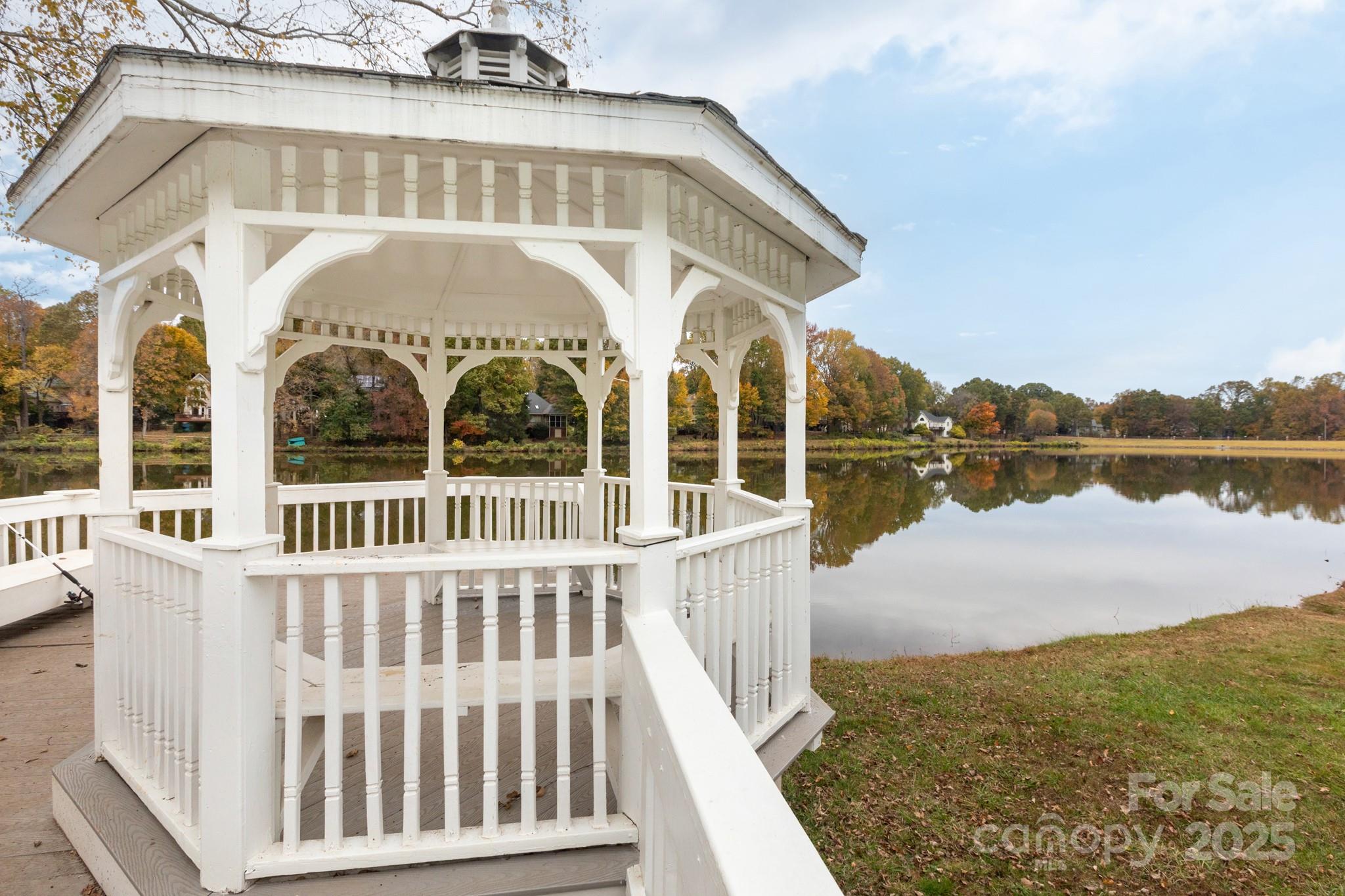 9112 Laurel Ridge Trail Charlotte, NC 28269 - Photo 32 of 38 a view of a large building with a lake