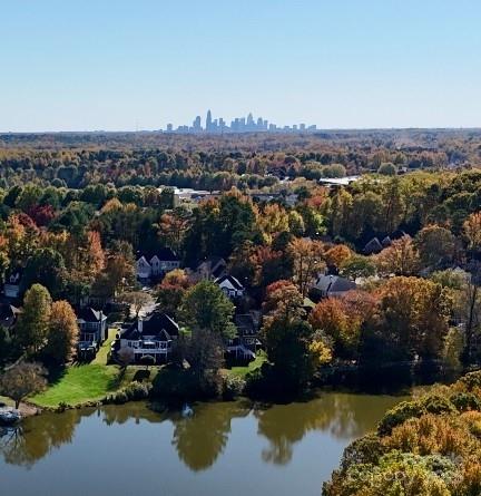 9112 Laurel Ridge Trail Charlotte, NC 28269 - Photo 34 of 38 an aerial view of a house with a lake view