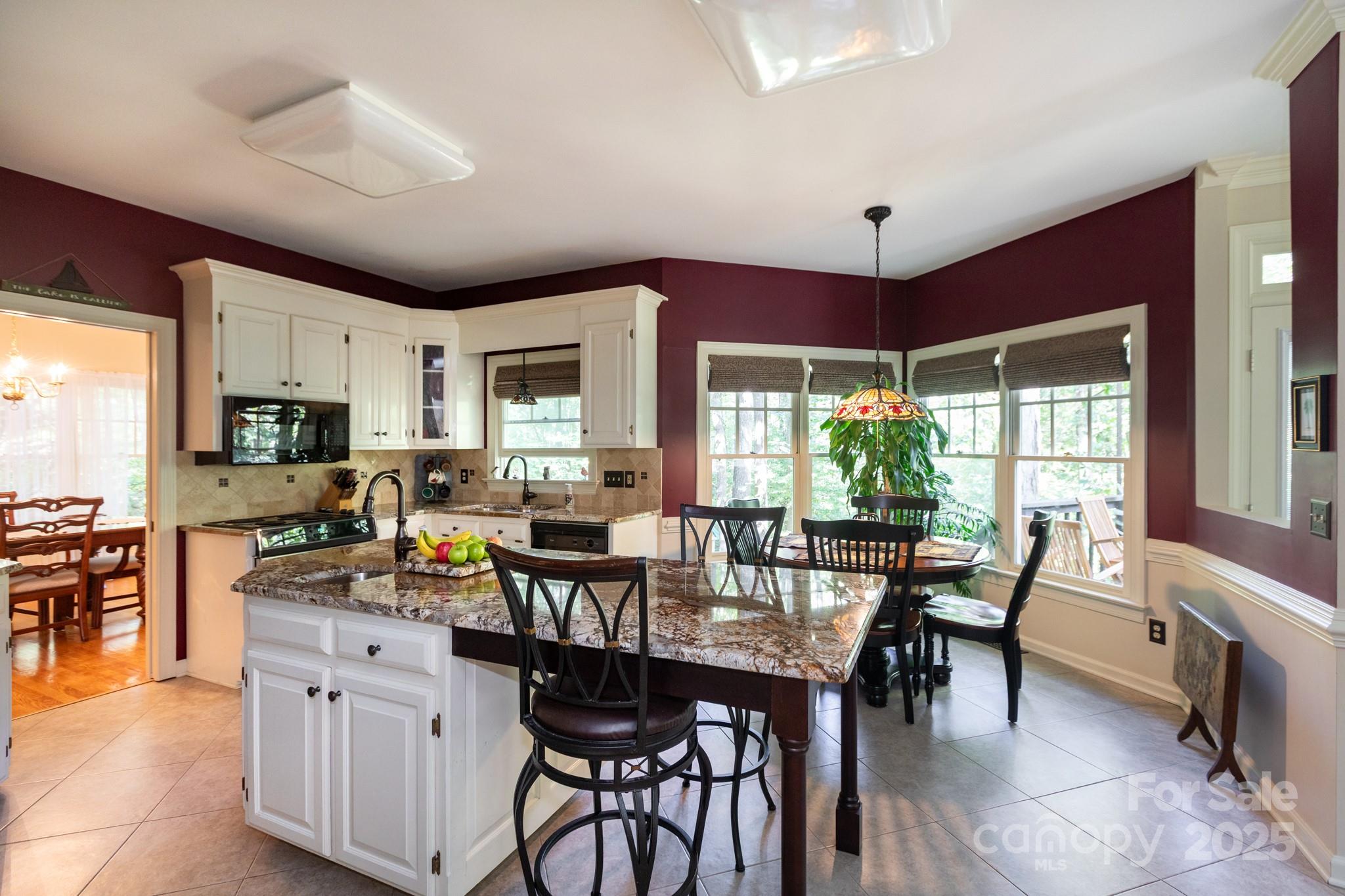 9112 Laurel Ridge Trail Charlotte, NC 28269 - Photo 7 of 38 a view of a dining room with furniture window and outside view