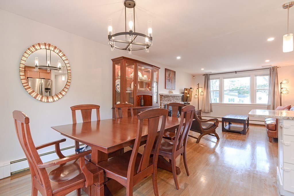 14 Oakcrest Drive Framingham, MA 01701 - Photo 11 of 42 a view of a dining room with furniture window and wooden floor