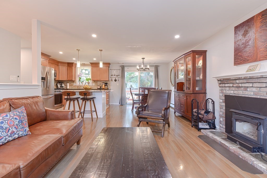 14 Oakcrest Drive Framingham, MA 01701 - Photo 14 of 42 a living room with furniture and a fireplace