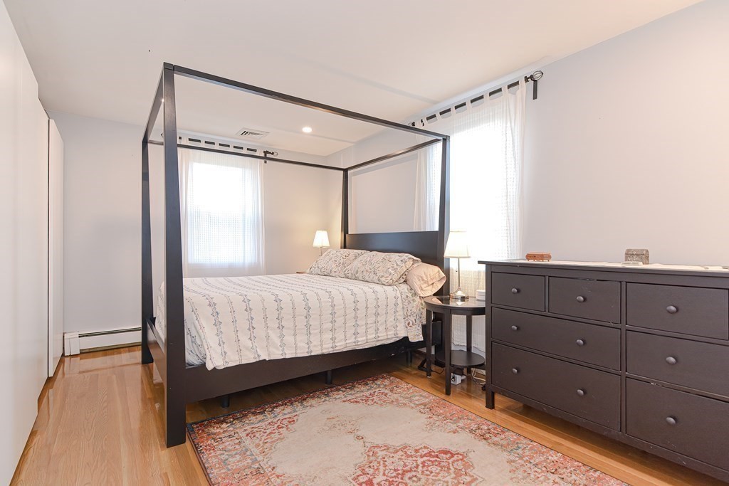 14 Oakcrest Drive Framingham, MA 01701 - Photo 18 of 42 a bedroom with a bed and a dresser