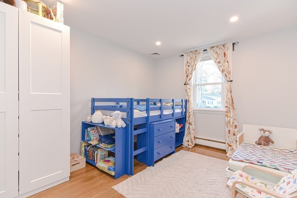14 Oakcrest Drive Framingham, MA 01701 - Photo 20 of 42 a view of a bedroom with window and furniture