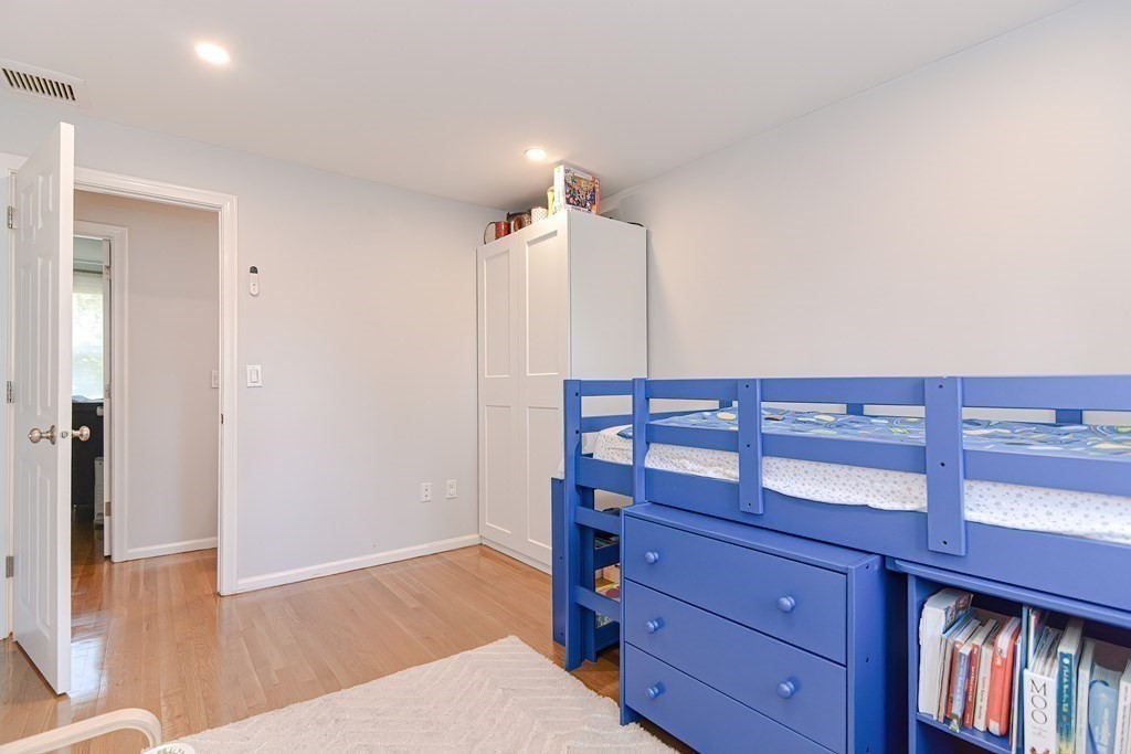 14 Oakcrest Drive Framingham, MA 01701 - Photo 21 of 42 a view of a bedroom with wooden floor
