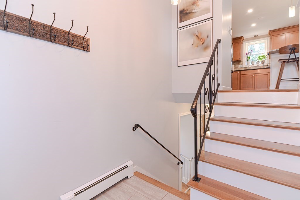 14 Oakcrest Drive Framingham, MA 01701 - Photo 24 of 42 a view of staircase with white walls and railing