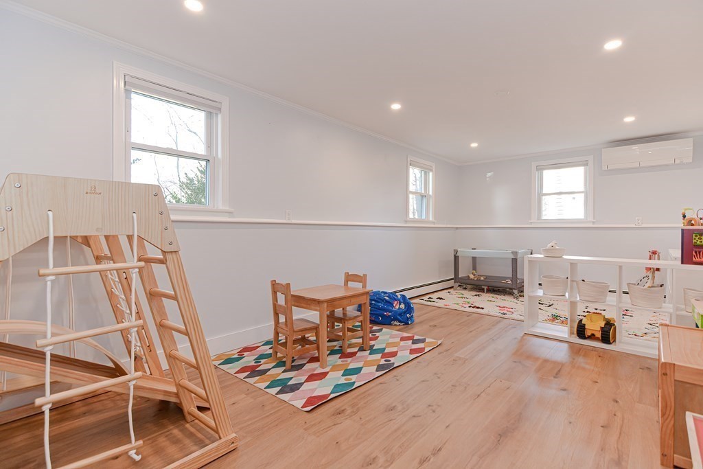 14 Oakcrest Drive Framingham, MA 01701 - Photo 25 of 42 a bed room with furniture and a window