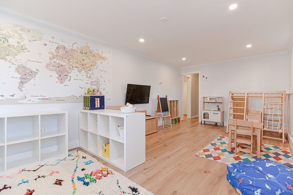 14 Oakcrest Drive Framingham, MA 01701 - Photo 27 of 42 a bedroom with furniture and flat screen tv
