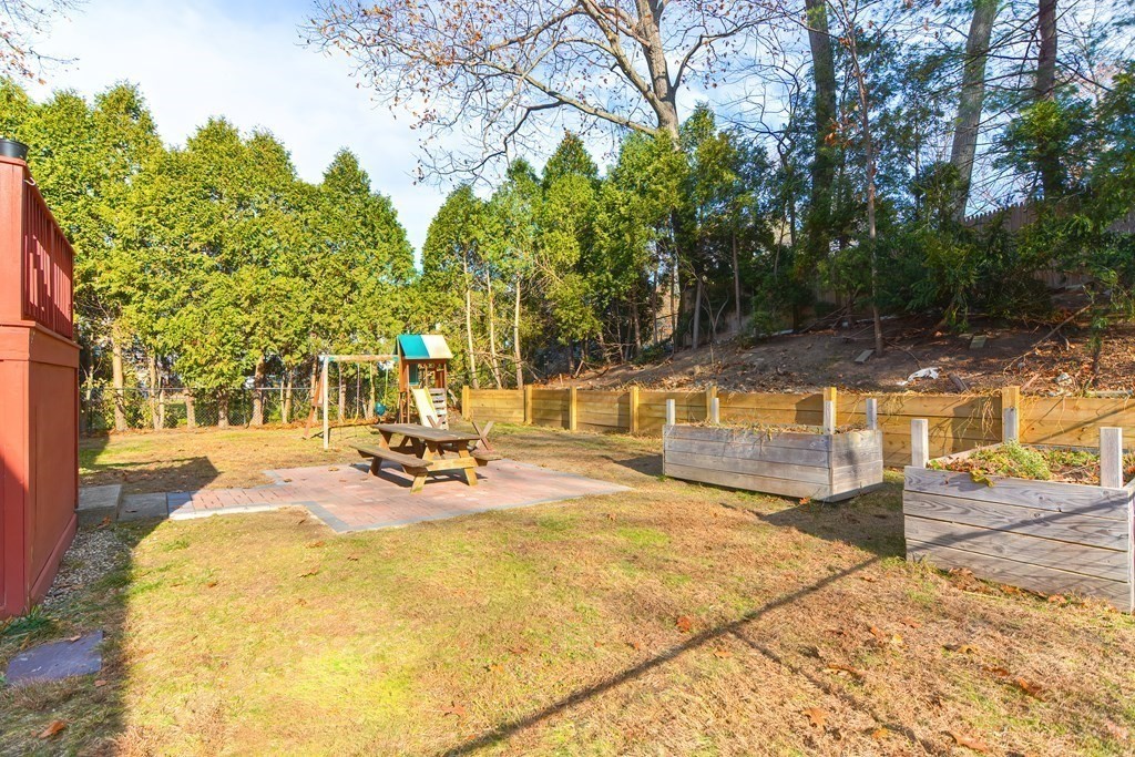14 Oakcrest Drive Framingham, MA 01701 - Photo 34 of 42 a view of a swimming pool with an outdoor seating