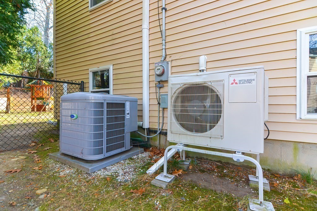 14 Oakcrest Drive Framingham, MA 01701 - Photo 38 of 42 a front view of a house with a yard