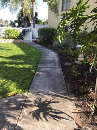 a view of a garden with pathway
