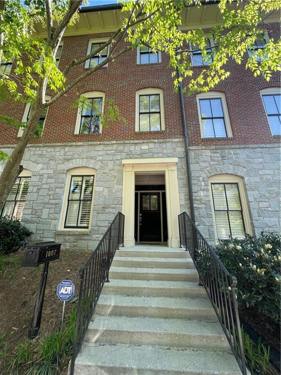 1867 Gordon Manor Northeast Atlanta, GA 30307 - Photo 1 of 34 a view of a brick building