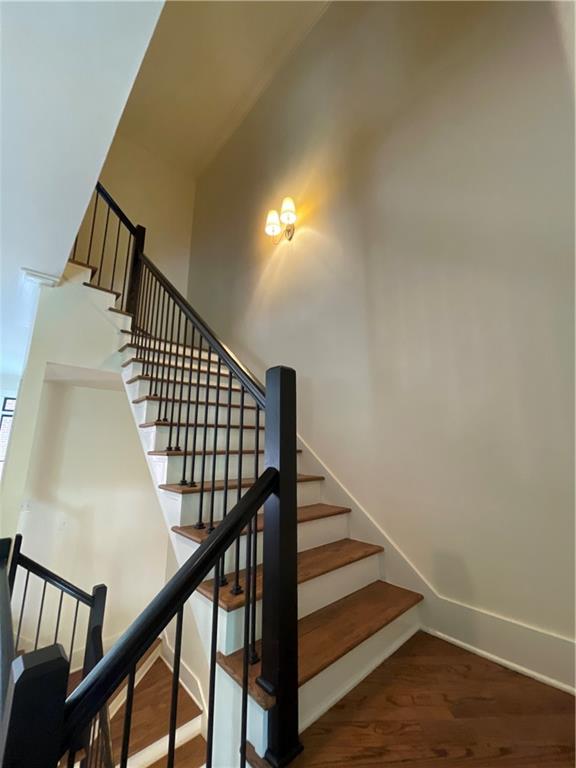 1867 Gordon Manor Northeast Atlanta, GA 30307 - Photo 19 of 34 a view of staircase with railing and white walls