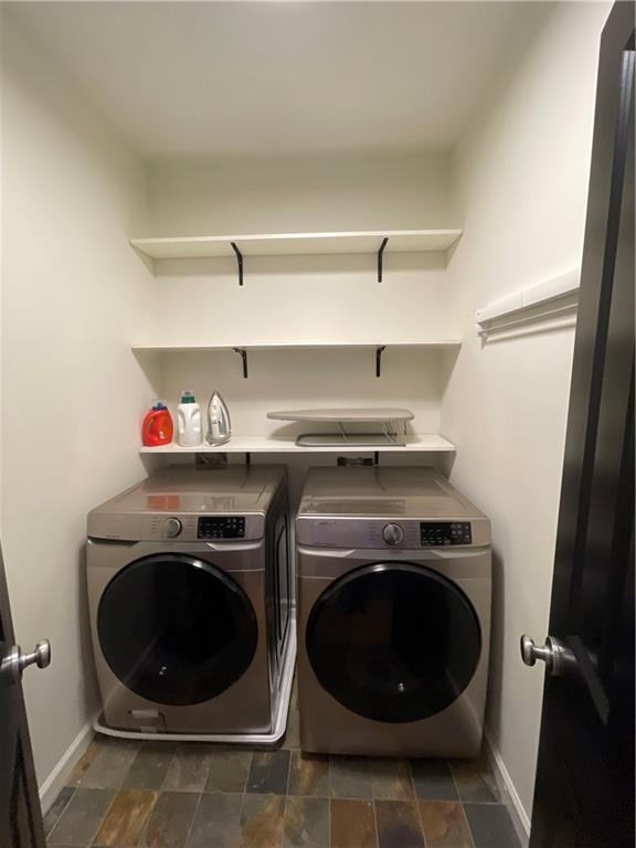 1867 Gordon Manor Northeast Atlanta, GA 30307 - Photo 20 of 34 a utility room with dryer and washer
