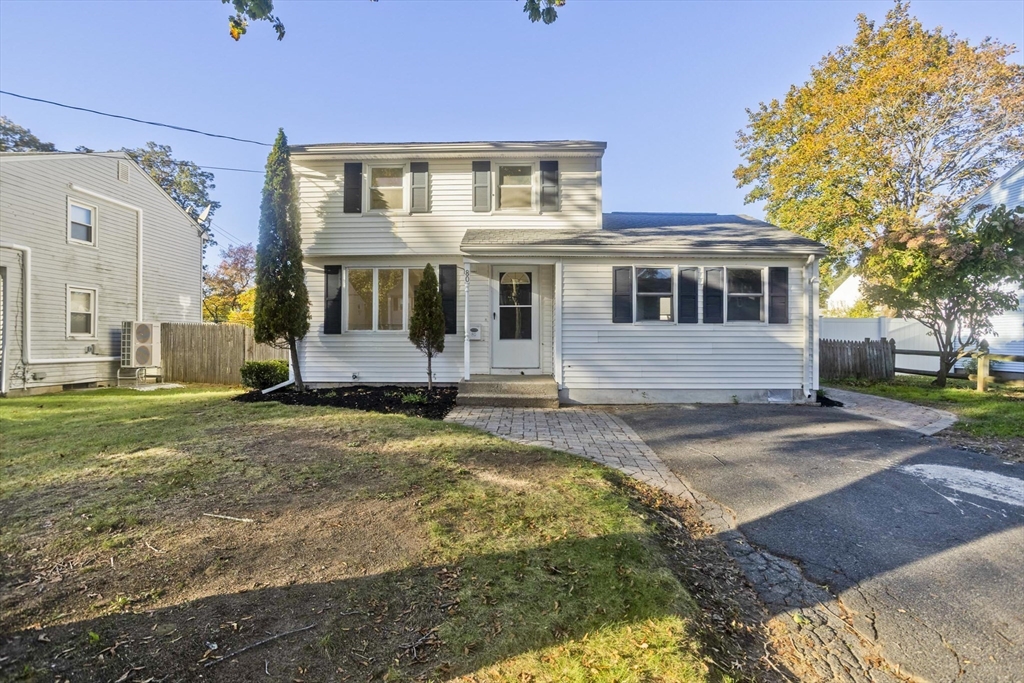 80 Tulsa Street Springfield, MA 01118 - Photo 1 of 23 a front view of a house with a yard