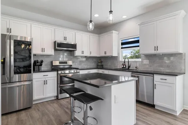 $410,000 | 3102 Katy Trail Drive, Harrisonville, MO 64701