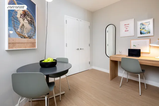 a view of a refrigerator in a kitchen