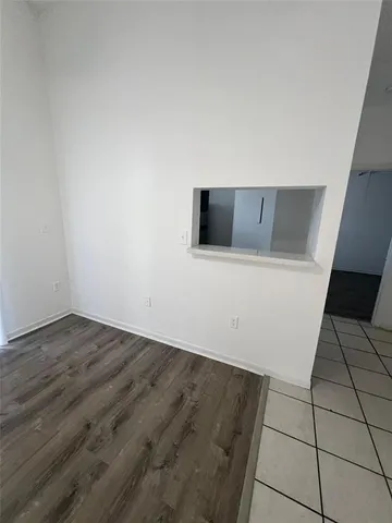 a view of wooden floor with a sink