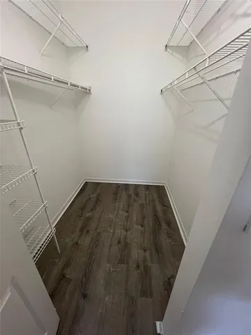 a view of a room with racks on the wall