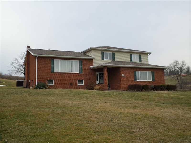 2263 Garards Fort Road Waynesburg, PA 15370 - Photo 1 of 25 Exterior Front. DREAM HOME HANDSOMELY DESIGNED ON OVER 19 BEAUTIFUL ACRES-Perfect family home in perfect location off Rolling Meadows Road - minutes from I-79; BRING YOUR HORSES!