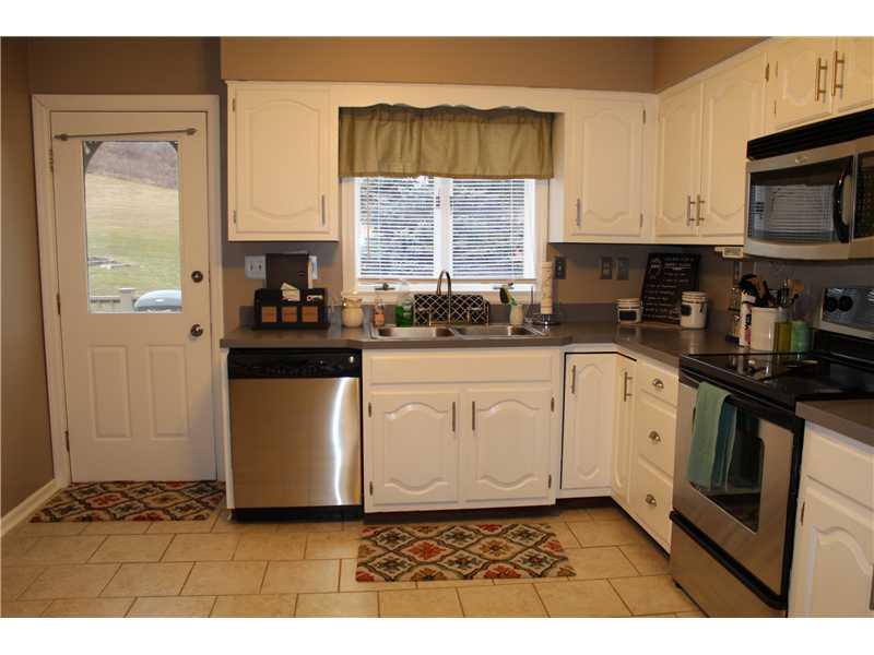 2263 Garards Fort Road Waynesburg, PA 15370 - Photo 11 of 25 Kitchen. Kitchen door leads to large deck for entertaining family and friends