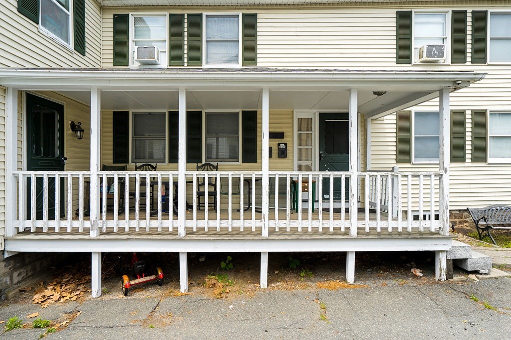 338 Cabot Street Beverly, MA 01915 - Photo 3 of 14 a view of a house with a wooden deck