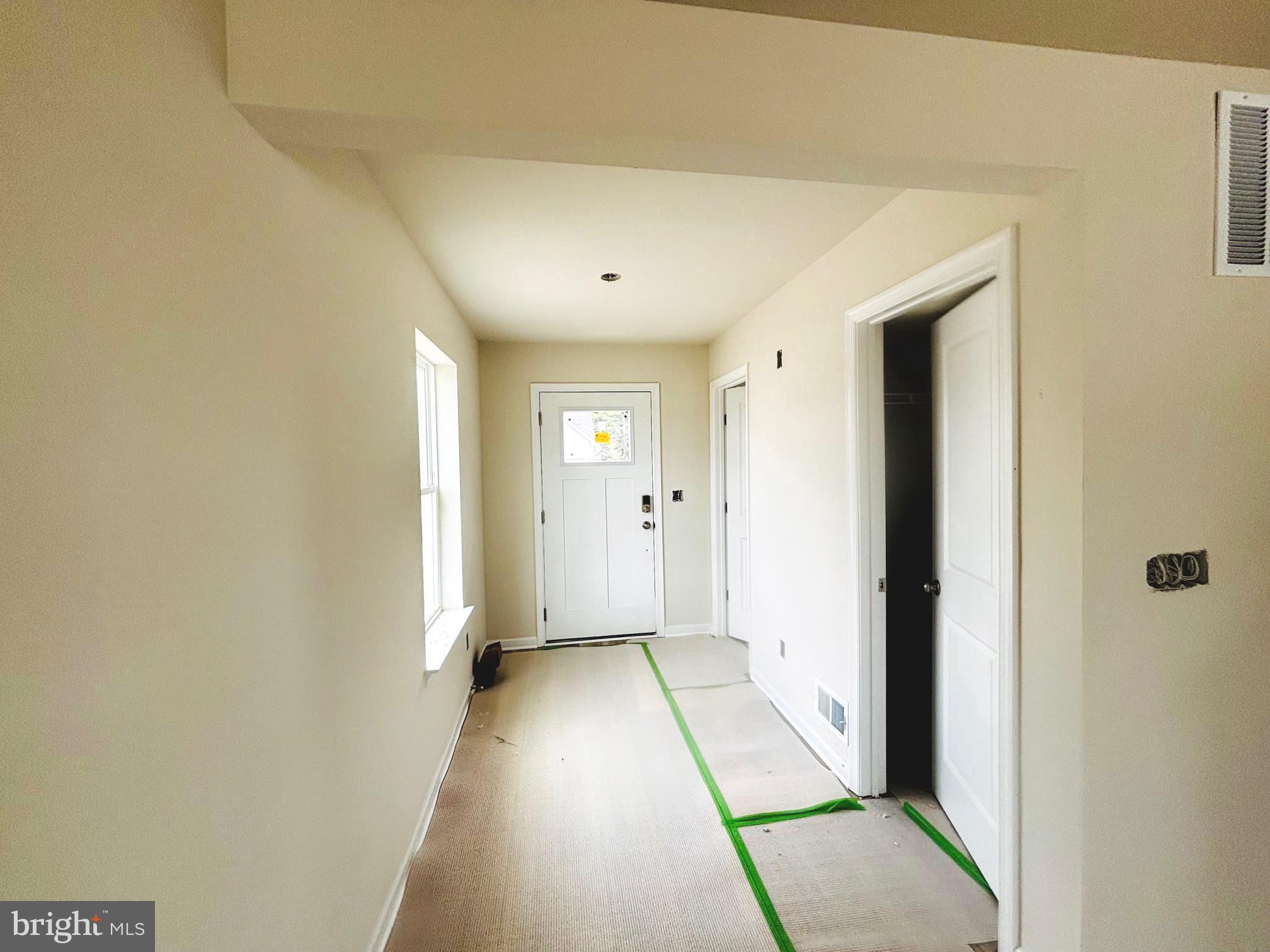 732 R Wilson Loop Georgetown, DE 19947 - Photo 4 of 41 a view of a big room with closet and wooden floor