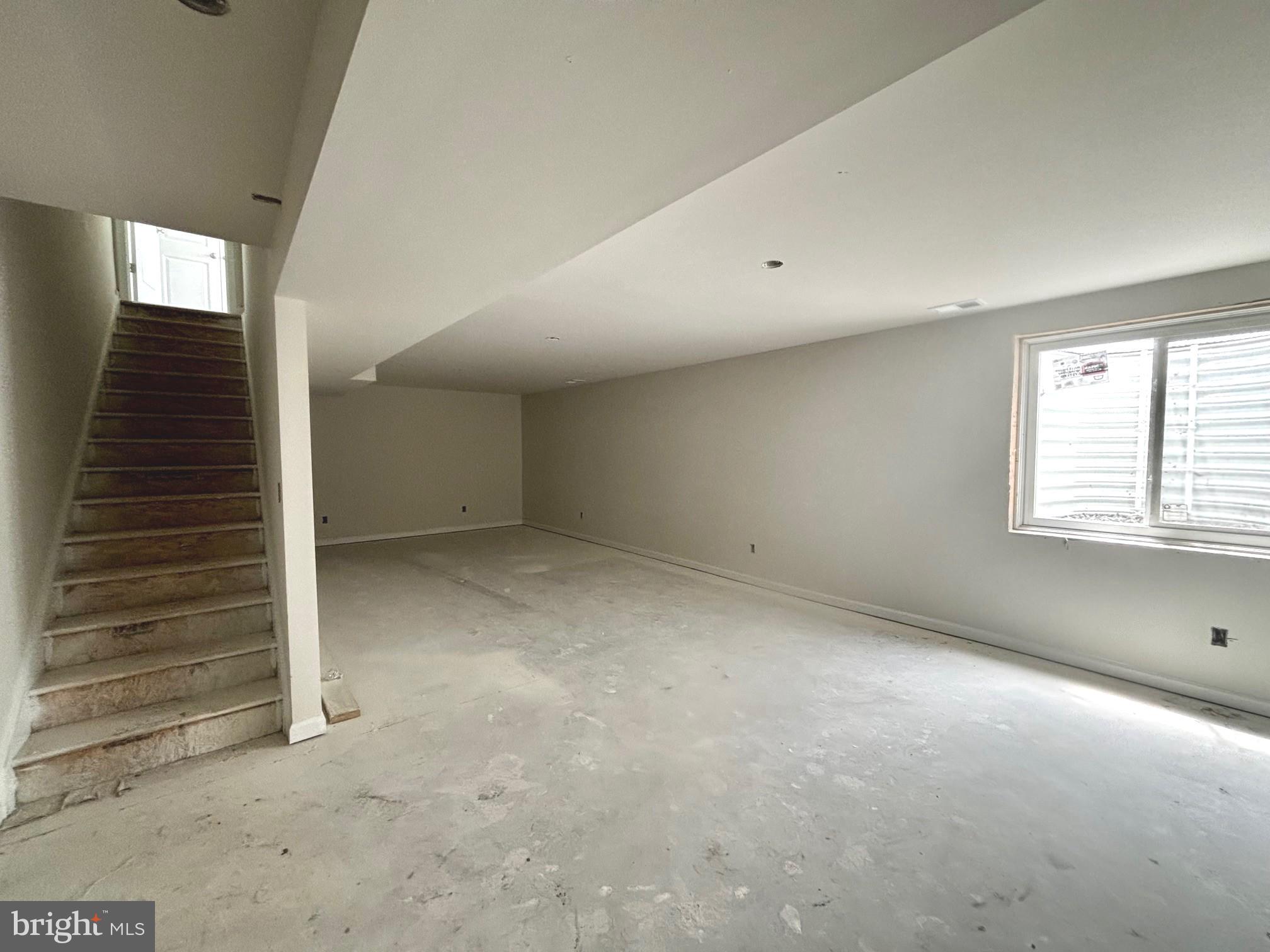 732 R Wilson Loop Georgetown, DE 19947 - Photo 8 of 41 a view of an empty room with a window