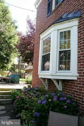 425 Chumleigh Road Baltimore, MD 21212 - Photo 14 of 26 a front view of a house with a yard