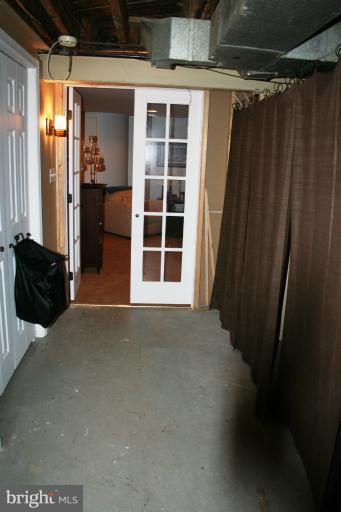 425 Chumleigh Road Baltimore, MD 21212 - Photo 22 of 26 a view of an empty room with a window