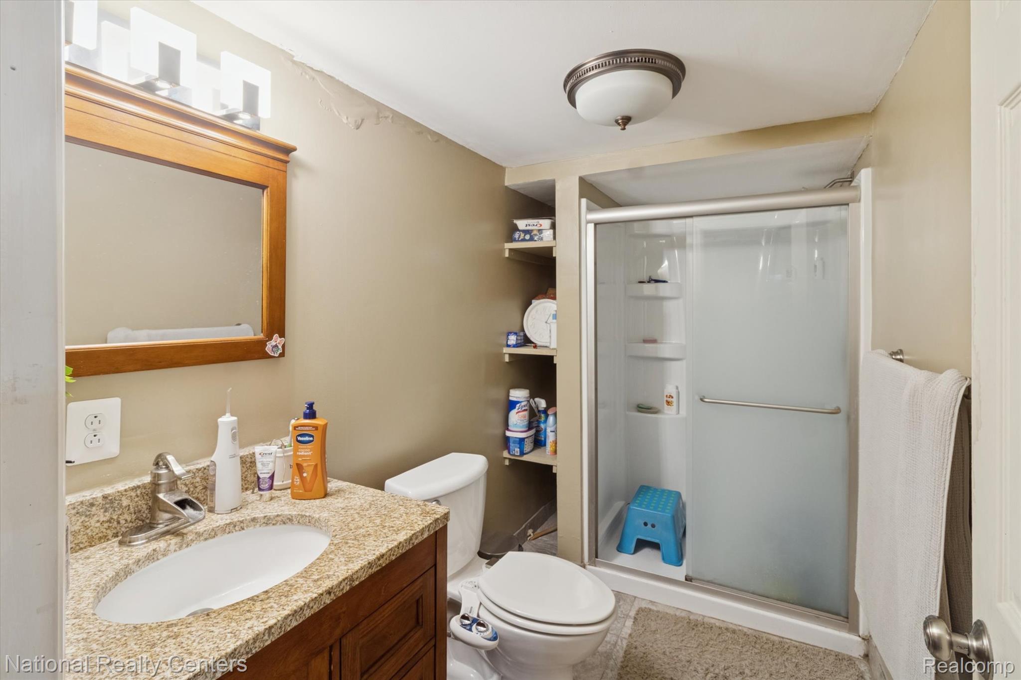 44768 Hanford Road Canton, MI 48187 - Photo 26 of 36 Full bathroom with a shower stall and vanity