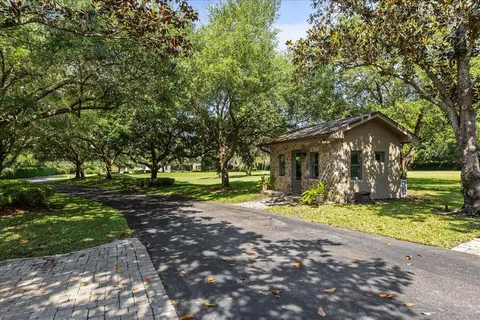 a view of entryway and hall with a front door