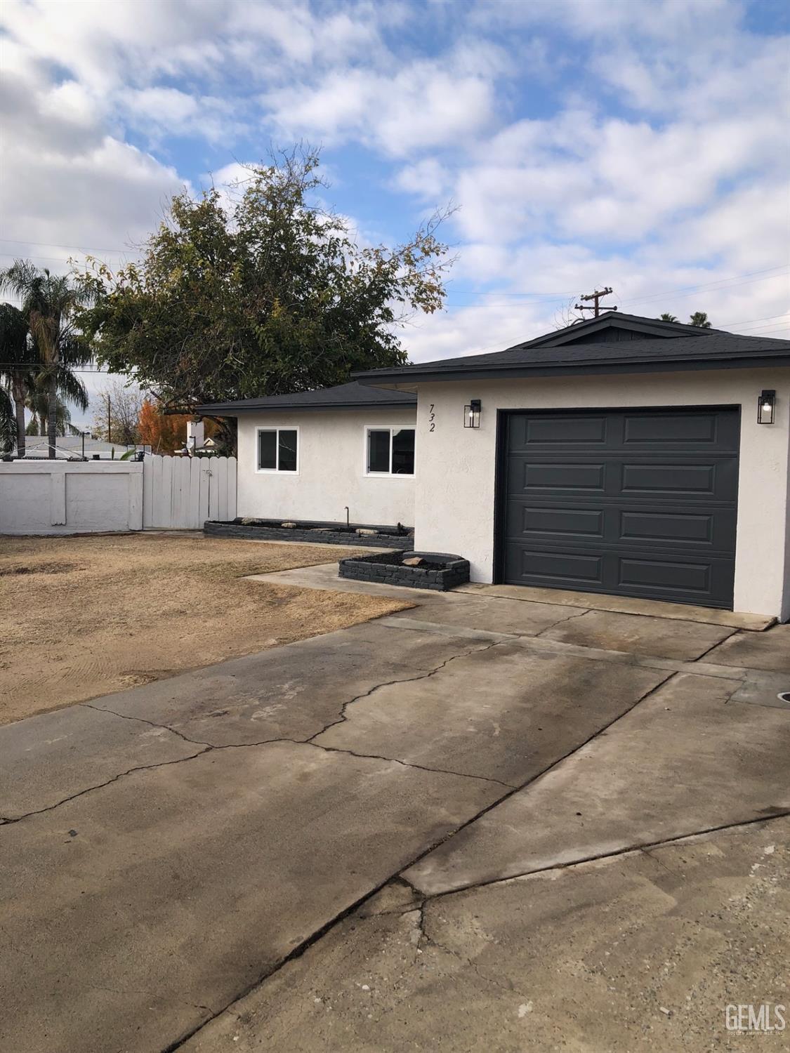 Undisclosed Address Bakersfield, CA 93306 - Photo 18 of 19 a view of a backyard of the house