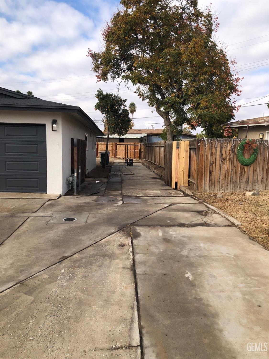 Undisclosed Address Bakersfield, CA 93306 - Photo 19 of 19 a backyard of a house