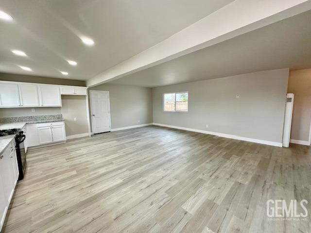 Undisclosed Address Bakersfield, CA 93306 - Photo 2 of 19 a view of a kitchen with a sink and a stove top oven