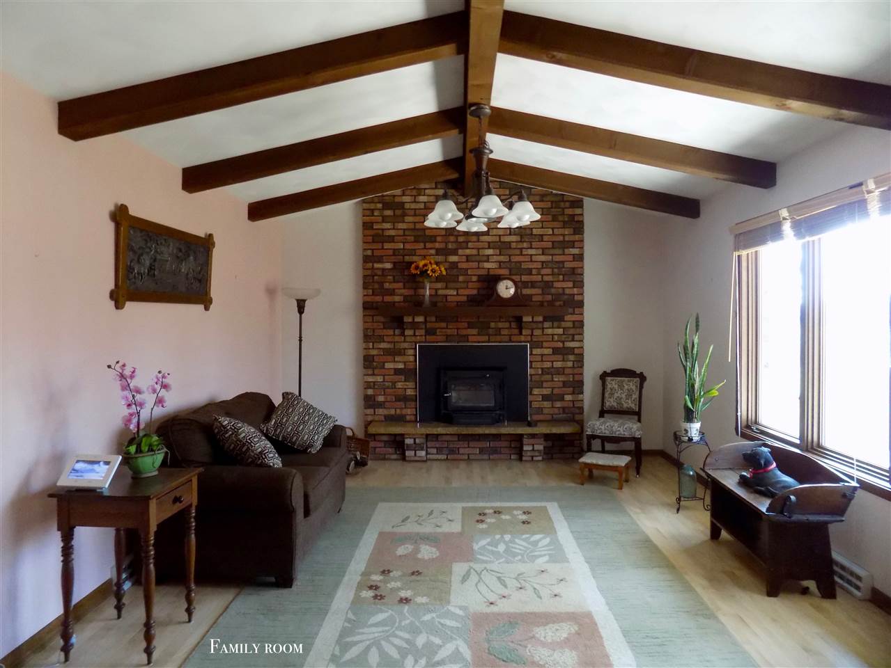 4401 Centerville Road Rockford, IL 61102 - Photo 9 of 23 a living room with furniture and a fireplace