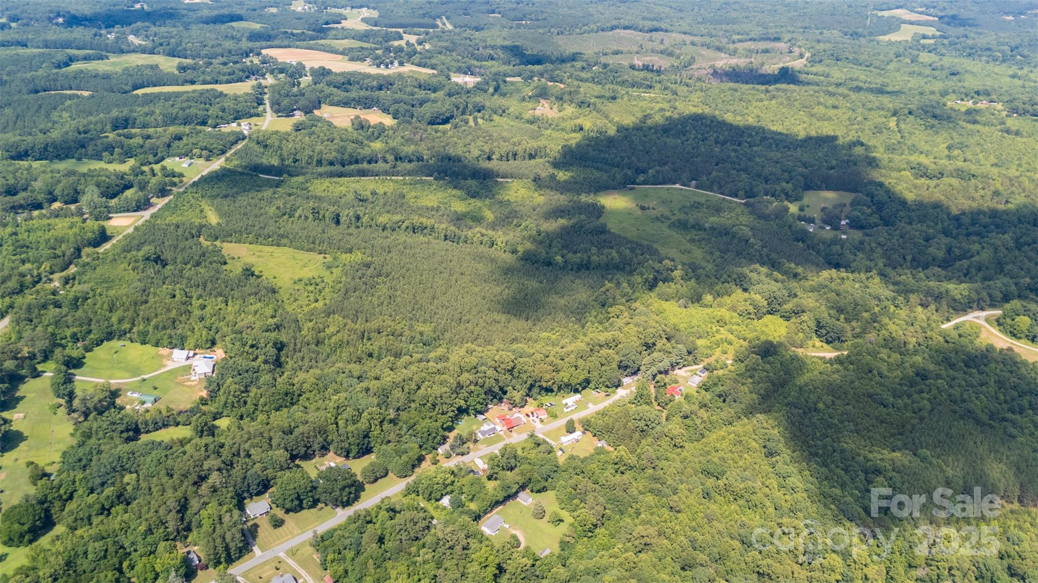 5623 Walters Mill Road Providence, NC 27315 - Photo 5 of 8 a view of a lake