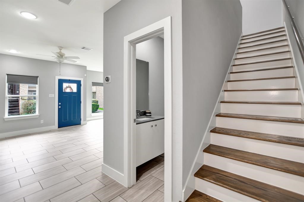 20 Evanston Street Houston, TX 77015 - Photo 11 of 31 a view of a hallway with wooden floor and entryway